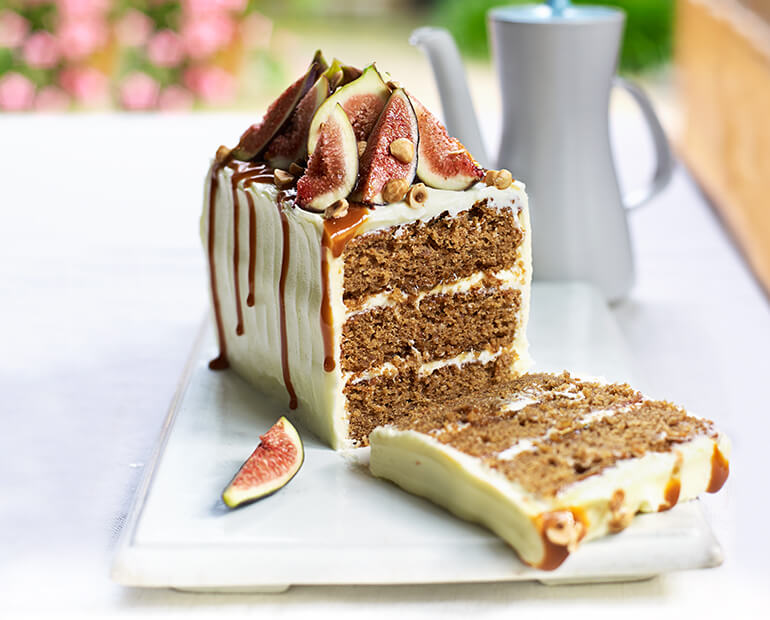 sliced loaf of fig hazelnut cake